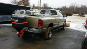 A truck is parked in the parking lot.