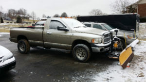 A truck is parked in the parking lot.
